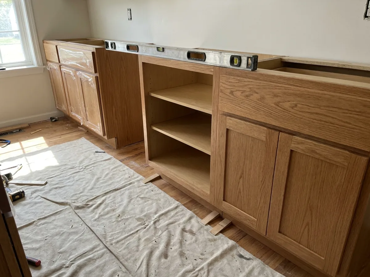 Kitchen Cabinet Installation underway on a job in Statesboro, GA